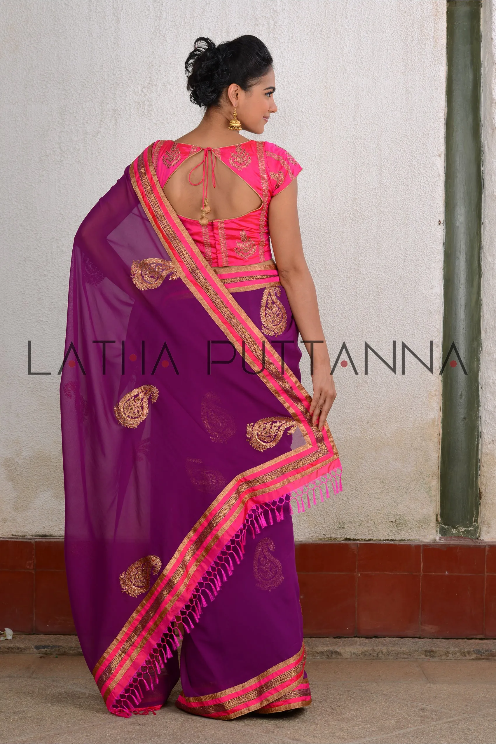 Mythili - Purple georgette saree with thread and sequence motifs